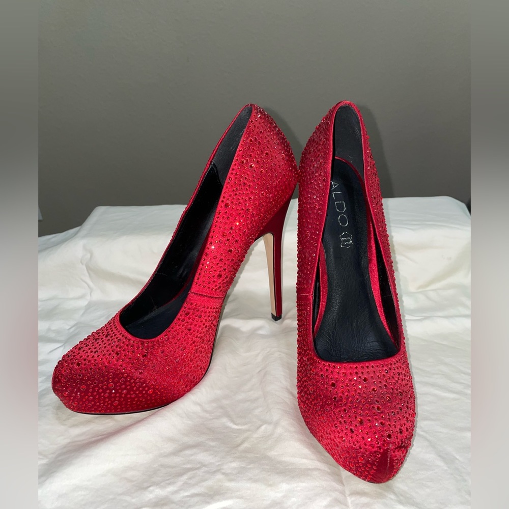 Aldo red sparkly heels.
